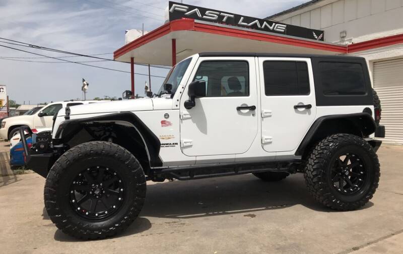 2012 Jeep Wrangler Unlimited for sale at FAST LANE AUTO SALES in San Antonio TX