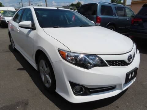 2014 Toyota Camry for sale at CarMart One LLC in Freeport NY