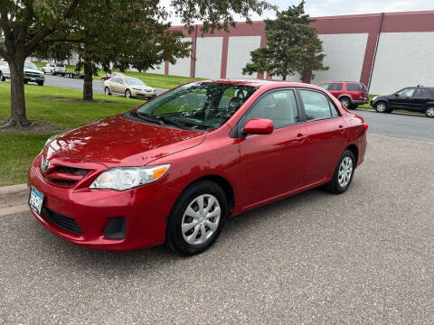 2011 Toyota Corolla for sale at Brighton Unique Auto Inc in New Brighton MN