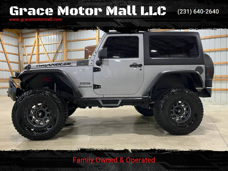 2016 Jeep Wrangler for sale at Grace Motor Mall LLC in Traverse City MI
