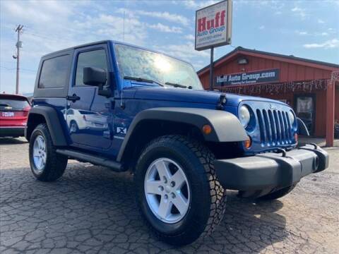 2009 Jeep Wrangler for sale at HUFF AUTO GROUP in Jackson MI