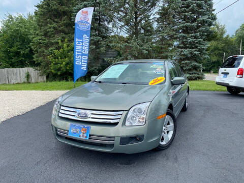 2009 Ford Fusion for sale at DISTINCT AUTO GROUP LLC in Kent OH