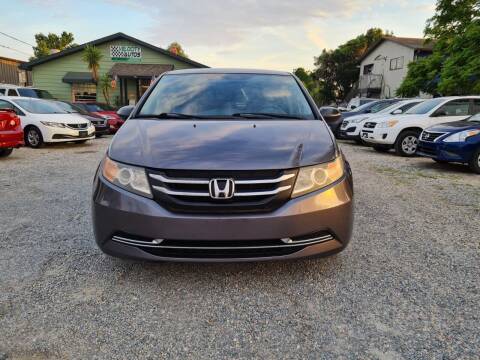 2017 Honda Odyssey for sale at Velocity Autos in Winter Park FL