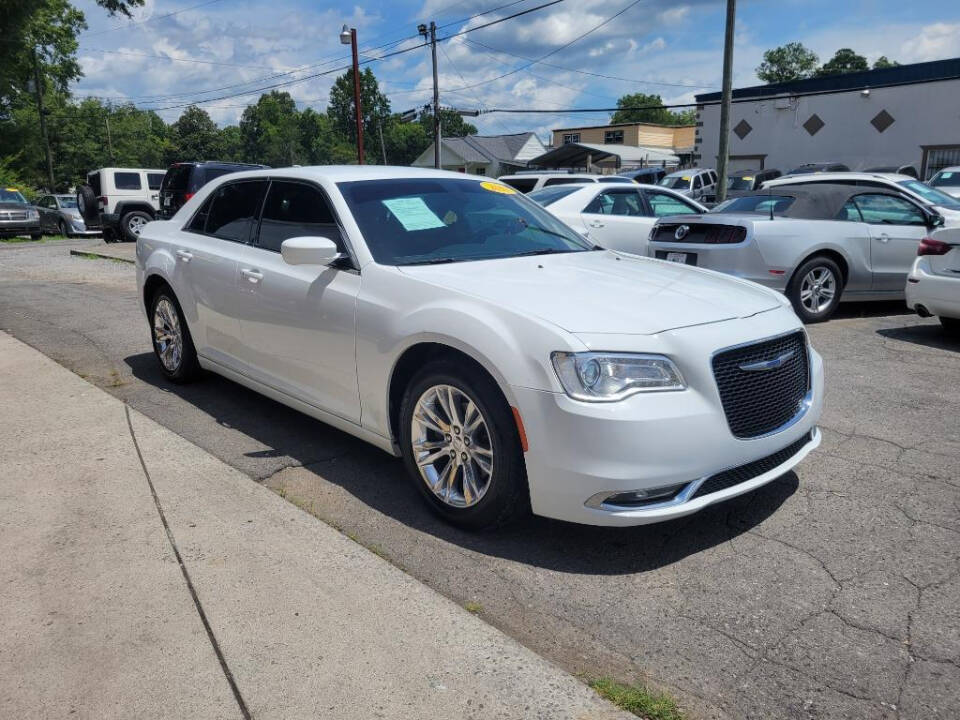 2018 Chrysler 300 for sale at DAGO'S AUTO SALES LLC in Dalton, GA