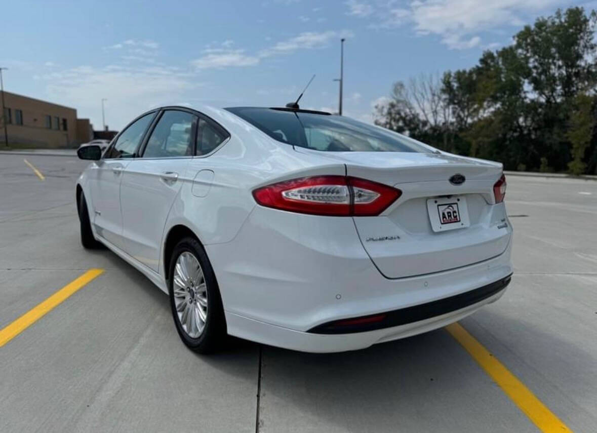 2013 Ford Fusion Hybrid for sale at Arc Auto Sales in Omaha, NE