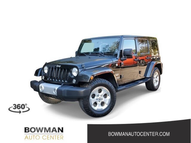 2014 Jeep Wrangler Unlimited for sale at Bowman Auto Center in Clarkston, MI