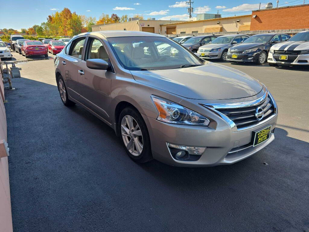 2015 Nissan Altima for sale at ENZO AUTO in Parma, OH