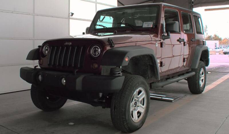 2012 Jeep Wrangler Unlimited for sale at GOLDEN RULE AUTO in Newark OH