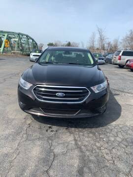 2014 Ford Taurus for sale at WXM Auto in Cortland NY