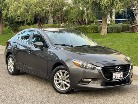 2017 Mazda MAZDA3 for sale at MILLENNIUM MOTORS in Van Nuys CA