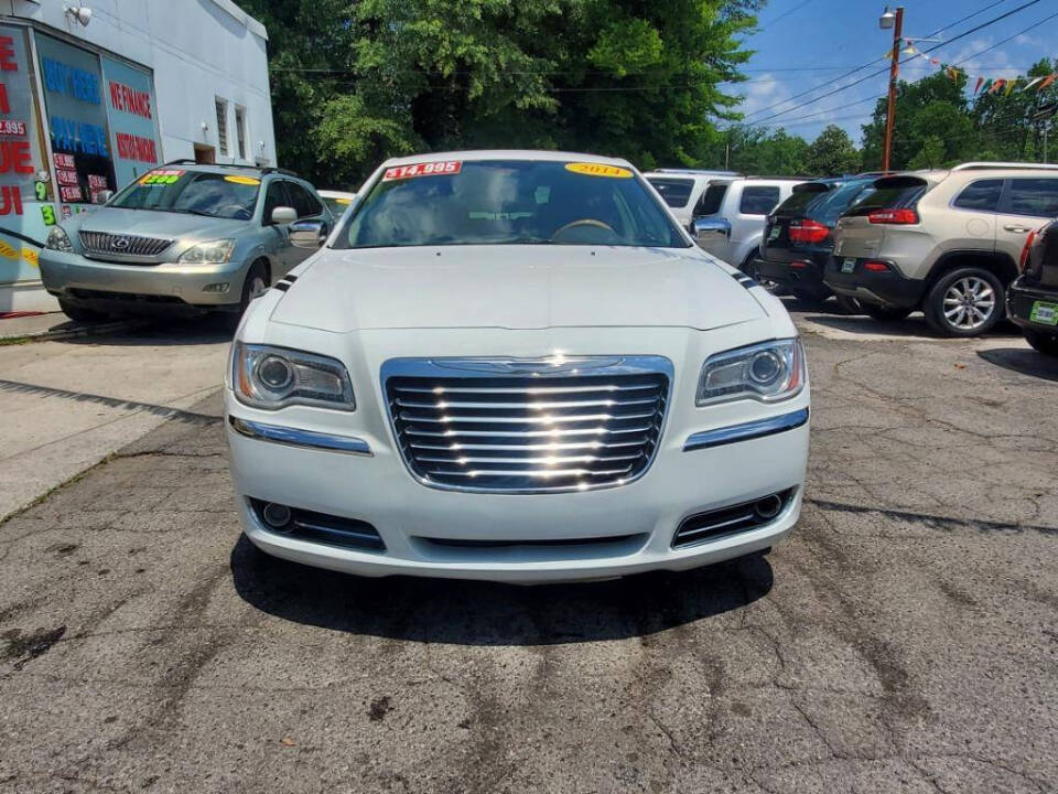 2014 Chrysler 300 for sale at DAGO'S AUTO SALES LLC in Dalton, GA