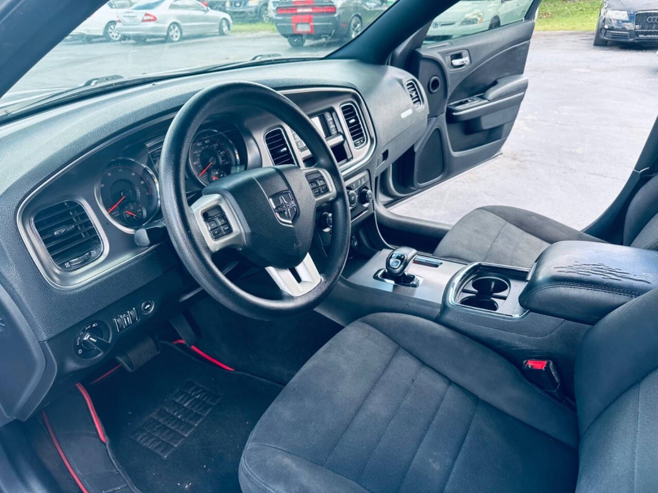 2013 Dodge Charger for sale at NOVA AUTO SALES in Orlando, FL