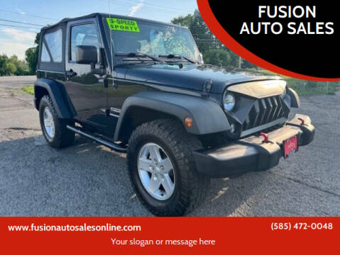 2016 Jeep Wrangler for sale at FUSION AUTO SALES in Spencerport NY