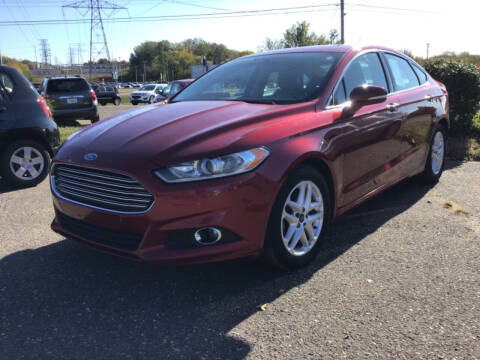 2015 Ford Fusion for sale at Sparkle Auto Sales in Maplewood MN