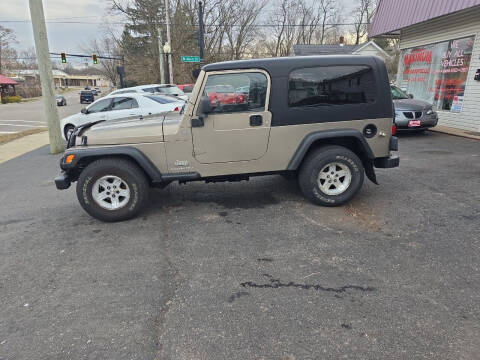 2004 Jeep Wrangler for sale at Maximum Auto Group II INC in Cortland OH