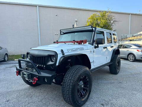 2013 Jeep Wrangler Unlimited for sale at Florida Cool Cars in Fort Lauderdale FL