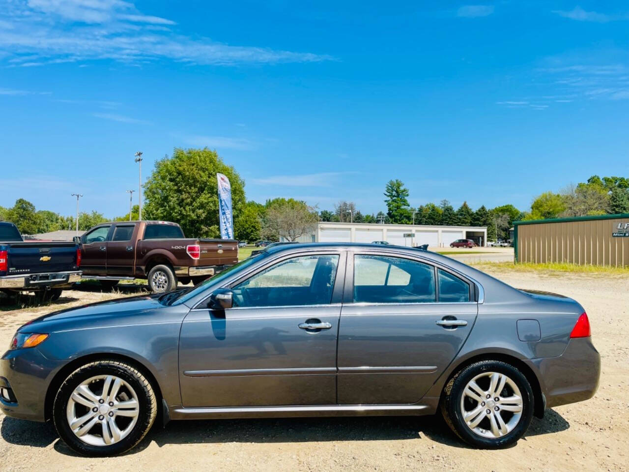 2009 Kia Optima for sale at Top Gear Auto Sales LLC in Le Roy, MN