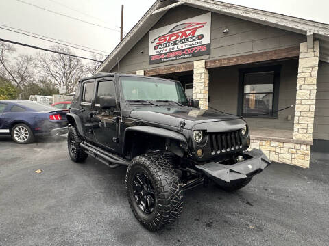 2013 Jeep Wrangler Unlimited for sale at SDM Auto Sales in Temple TX