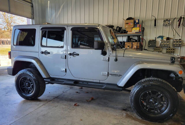 2013 Jeep Wrangler Unlimited for sale at COOPER AUTO SALES in ONEIDA, TN