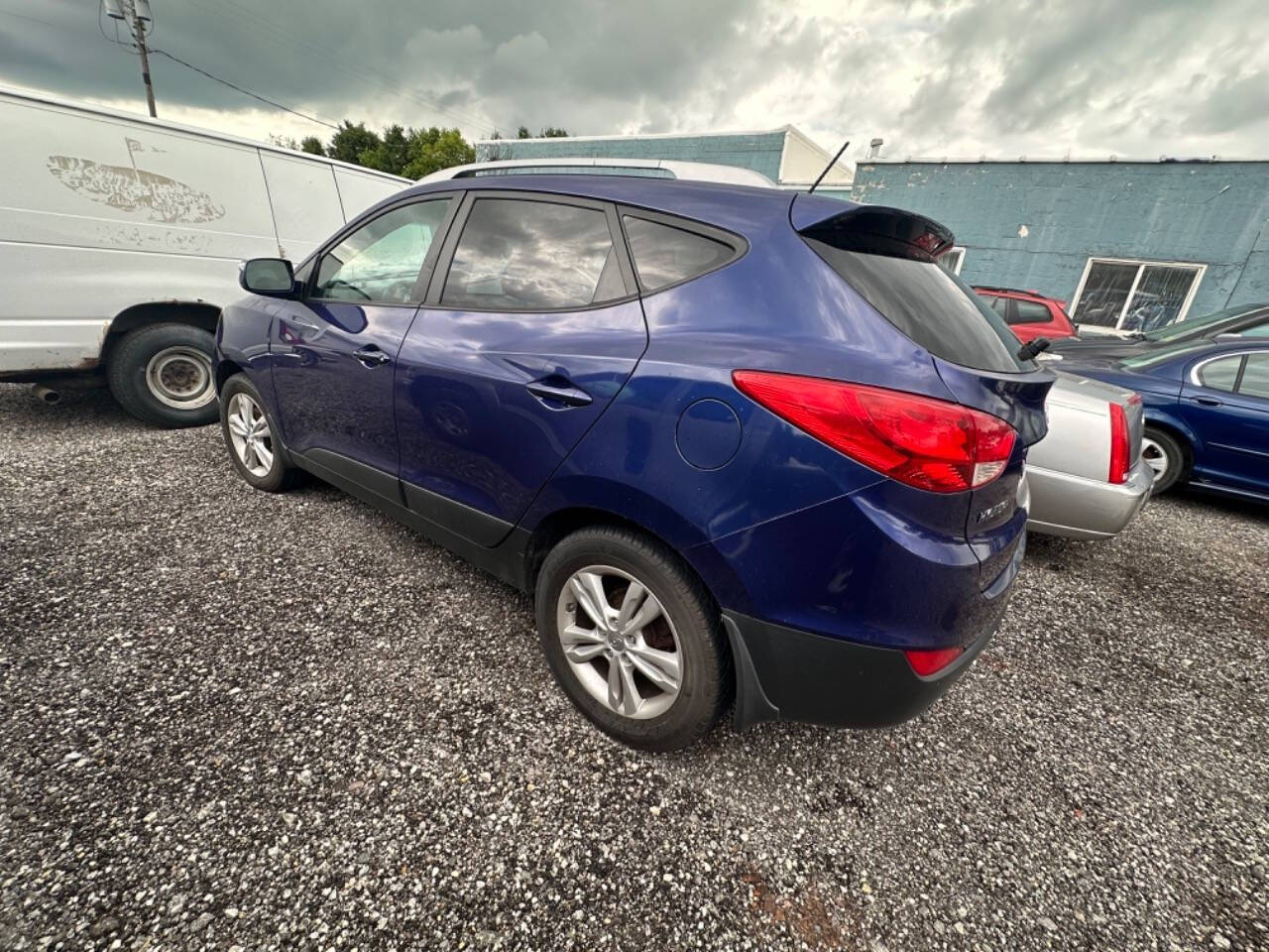 2013 Hyundai TUCSON for sale at ABC AUTO SALES AND SERVICE in Bristol, IN