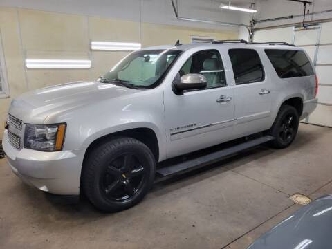 2014 Chevrolet Suburban for sale at MADDEN MOTORS INC in Peru IN
