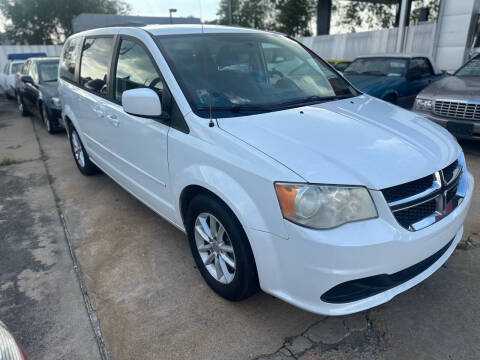 2014 Dodge Grand Caravan for sale at Buy-Fast Autos in Houston TX