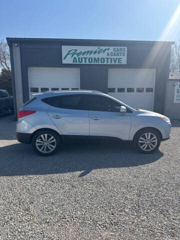 2011 Hyundai Tucson for sale at PREMIER AUTOMOTIVE in Lincoln MO