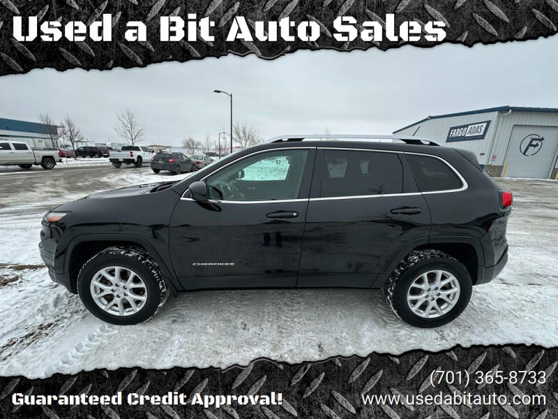 2014 Jeep Cherokee for sale at Used a Bit Auto Sales in Fargo ND