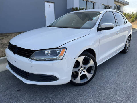 2012 Volkswagen Jetta for sale at FALCONS AUTOMOTIVE LLC in Buford GA