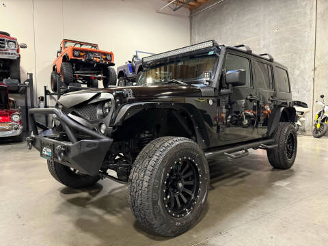 2014 Jeep Wrangler Unlimited for sale at Platinum Motors in Portland OR