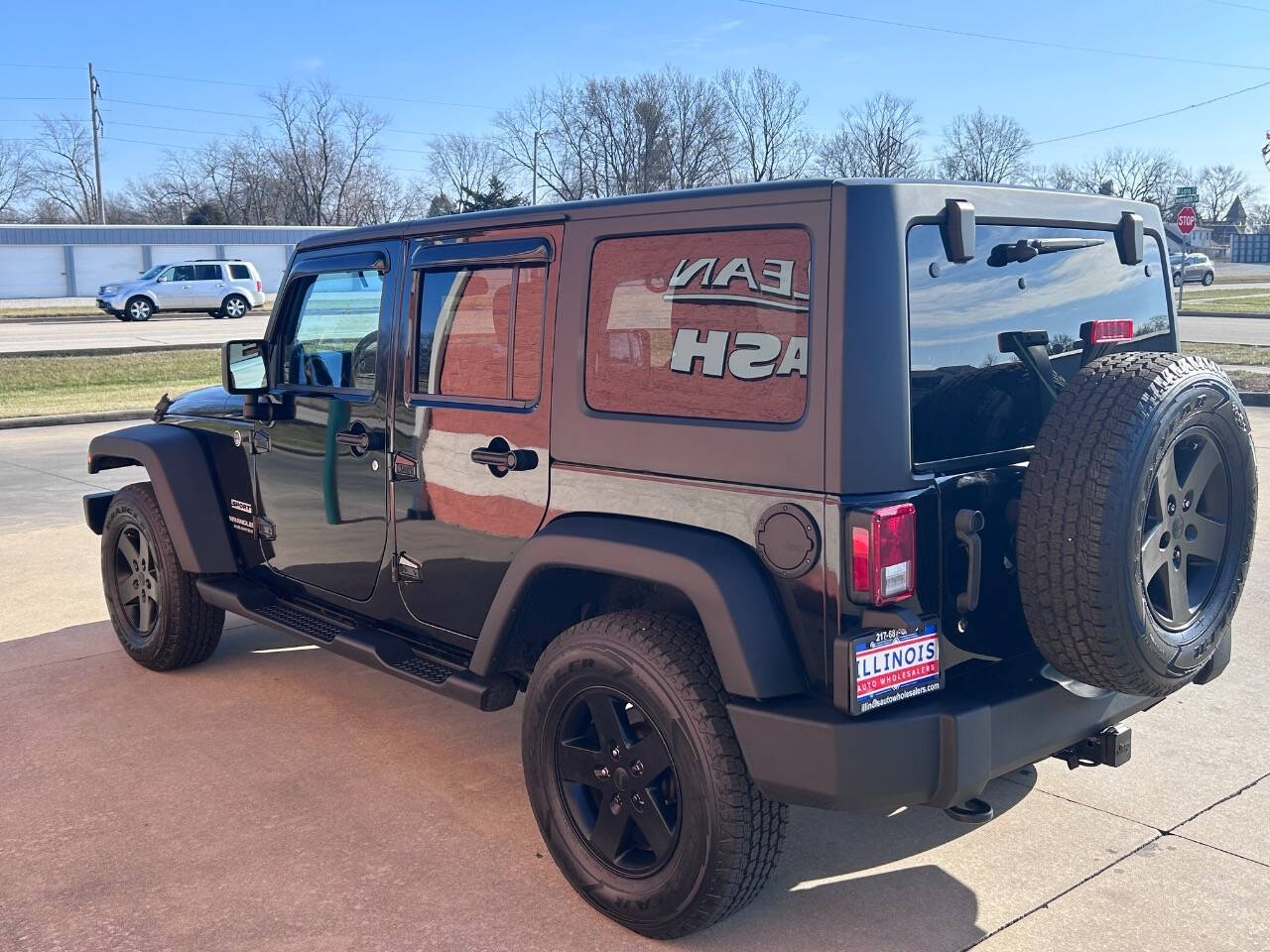 2014 Jeep Wrangler Unlimited for sale at Illinois Auto Wholesalers in Tolono, IL