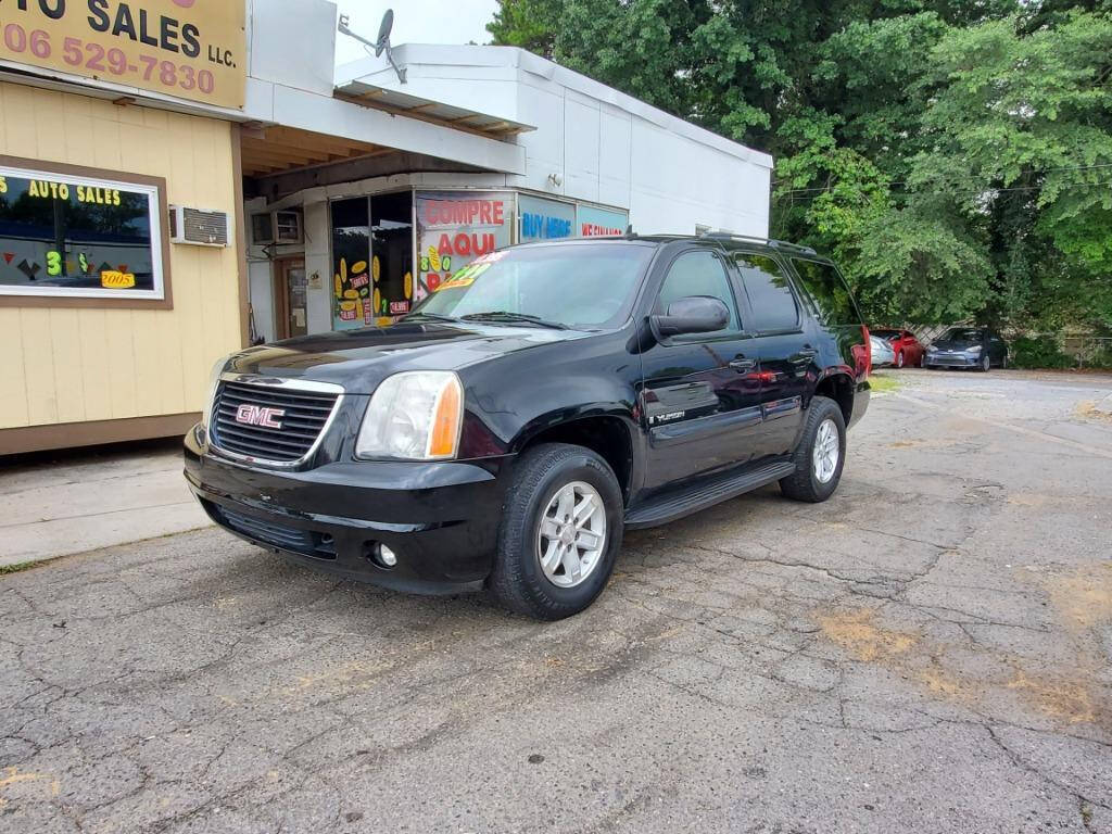 2008 GMC Yukon for sale at DAGO'S AUTO SALES LLC in Dalton, GA