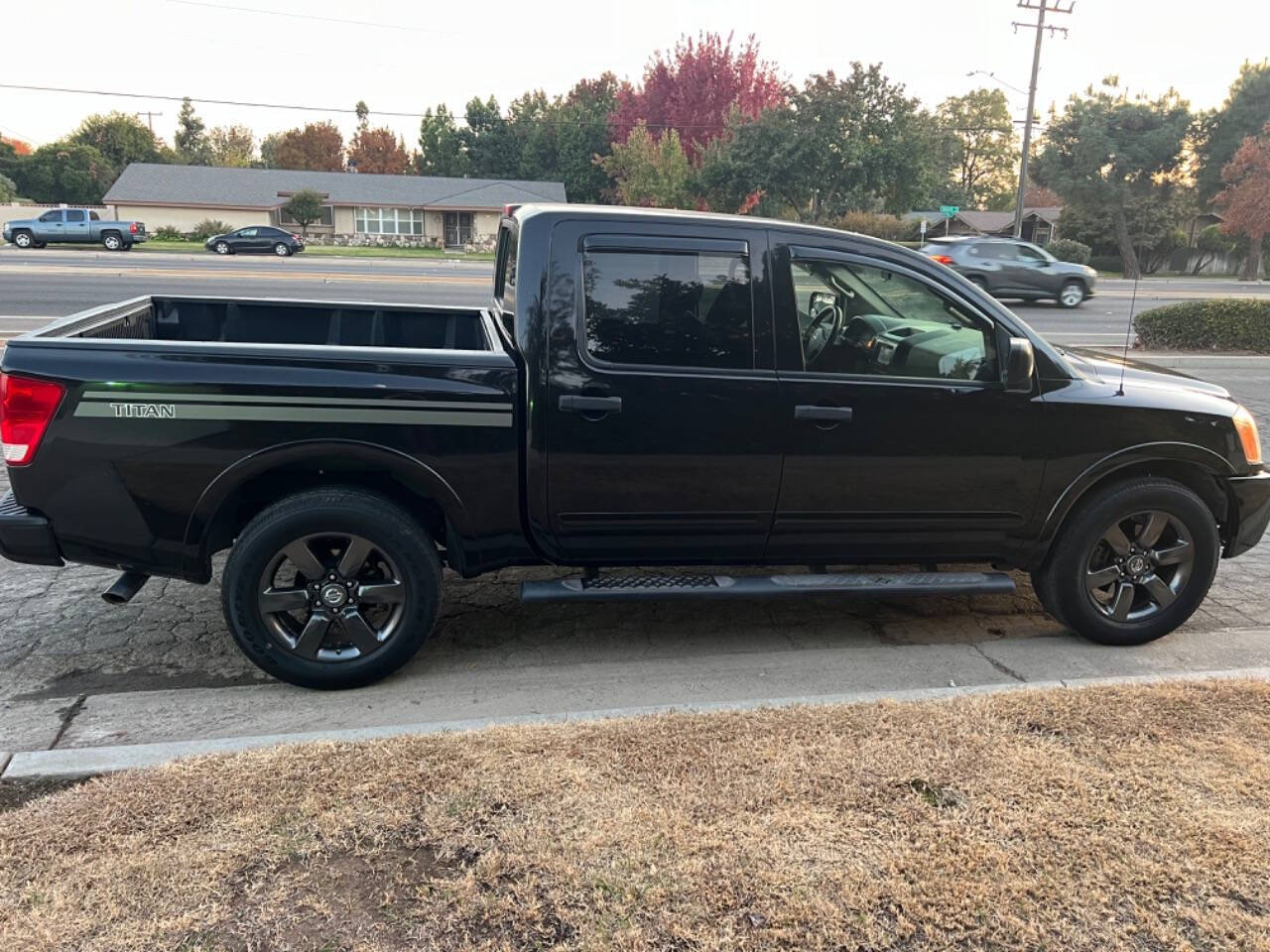 2012 Nissan Titan for sale at AUTO 4 LESS in Fresno, CA