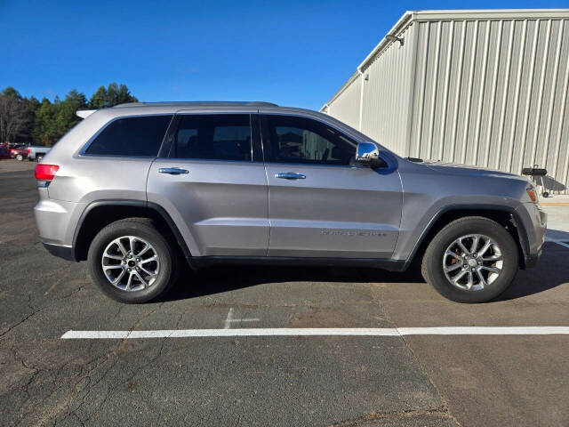 2014 Jeep Grand Cherokee for sale at Dedicated Auto Sales Inc in Elk River, MN