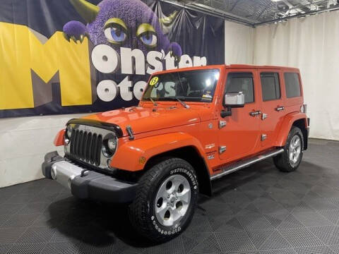 2015 Jeep Wrangler Unlimited for sale at Monster Motors in Michigan Center MI