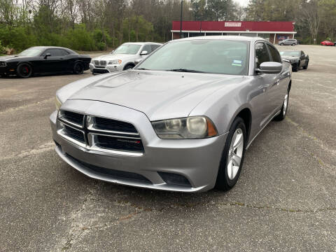 2014 Dodge Charger for sale at Certified Motors LLC in Mableton GA
