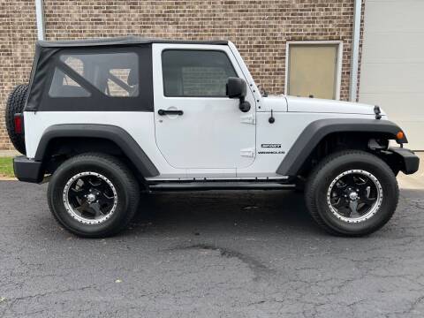 2015 Jeep Wrangler for sale at Triple C Auto Sales in Gainesville TX
