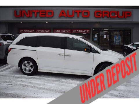 2012 Honda Odyssey for sale at United Auto Group in Putnam CT