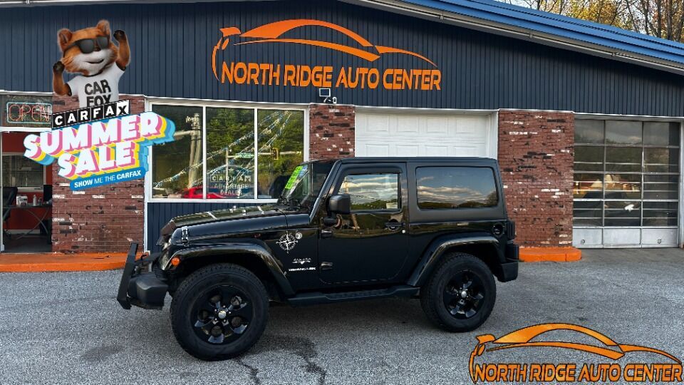 2016 Jeep Wrangler for sale at North Ridge Auto Center LLC in Madison, OH