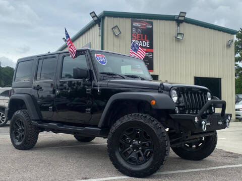2016 Jeep Wrangler Unlimited for sale at Premium Auto Group in Humble TX