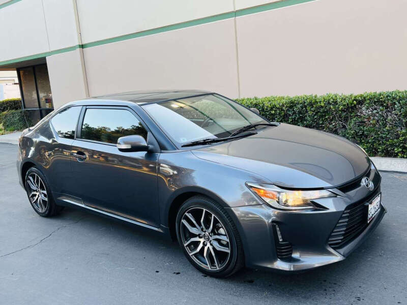 2015 Scion tC for sale at CARLIFORNIA AUTO WHOLESALE in San Bernardino CA