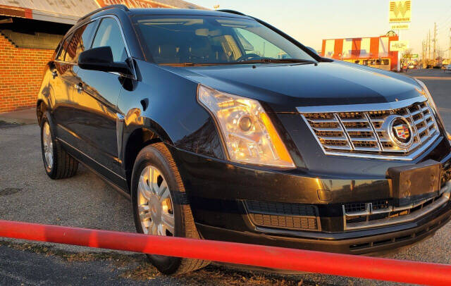 2013 Cadillac SRX for sale at DURANGO AUTO CENTER LLC in Tulsa, OK