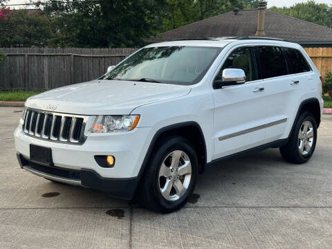 2013 Jeep Grand Cherokee for sale at KM Motors LLC in Houston TX