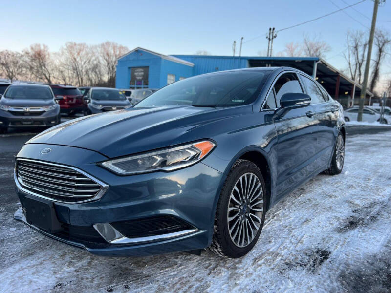 2018 Ford Fusion for sale at MGM Auto Group in Framingham MA