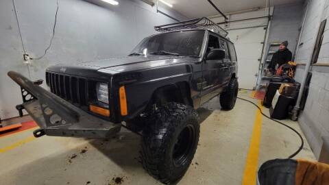 2000 Jeep Cherokee for sale at Tradewind Car Co in Muskegon MI