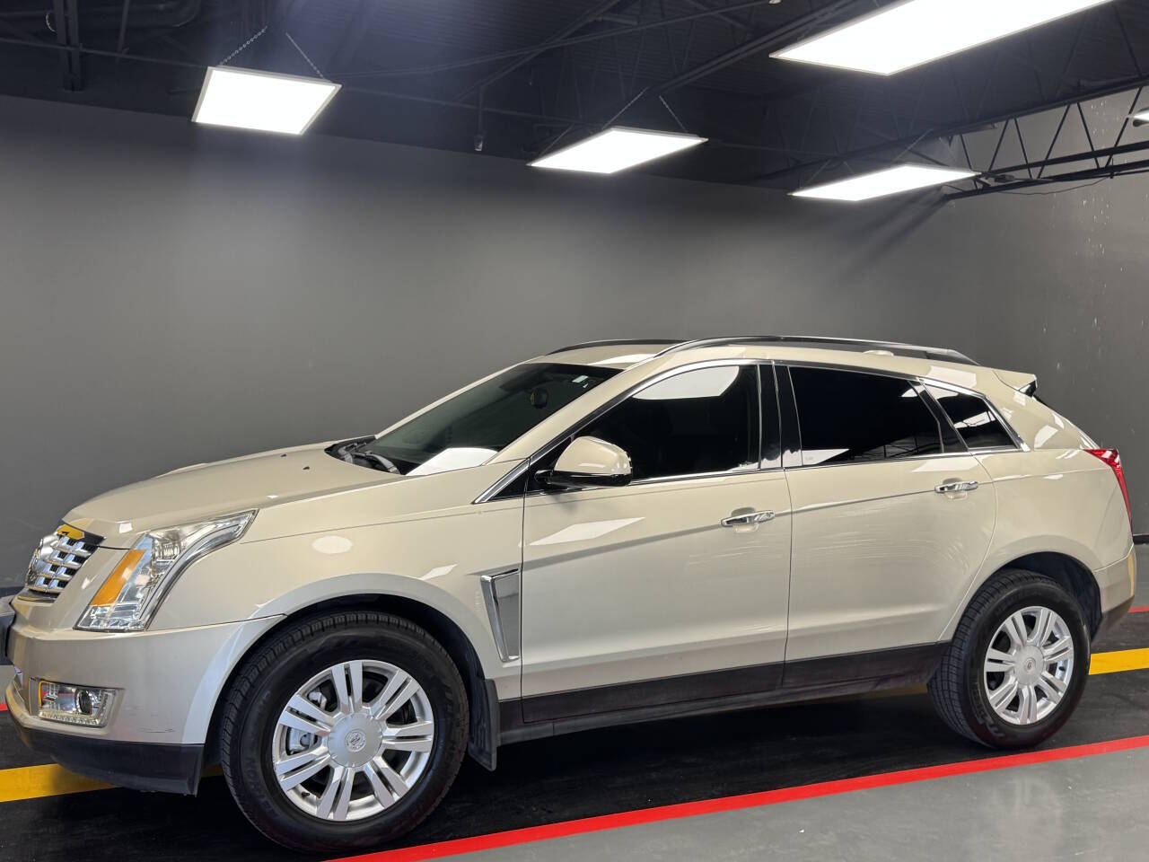 Gold 2015 Cadillac SRX Base 4dr SUV 2