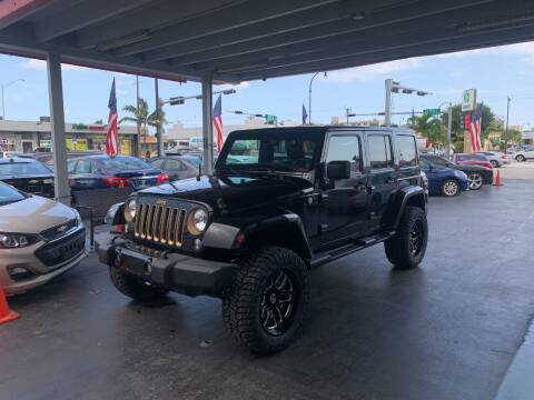 2014 Jeep Wrangler Unlimited for sale at American Auto Sales in Hialeah FL
