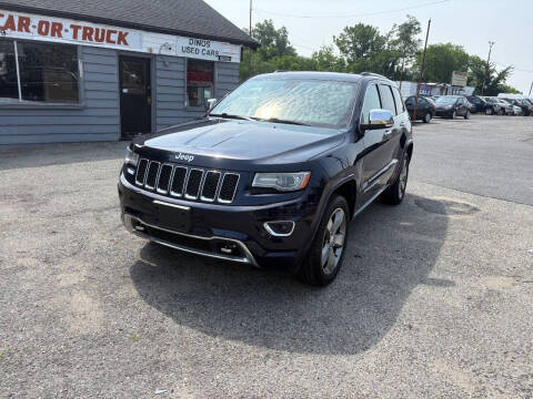 2014 Jeep Grand Cherokee for sale at Dino's Used Car Lot in Riverdale Park MD