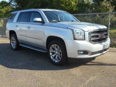 2015 GMC Yukon for sale at STRAHAN AUTO SALES INC in Hattiesburg MS