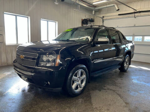 2013 Chevrolet Avalanche for sale at Sand's Auto Sales in Cambridge MN